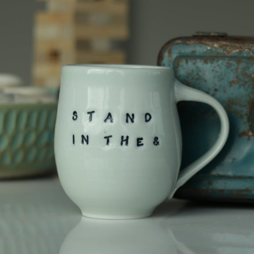 "Stand in the &" Mug